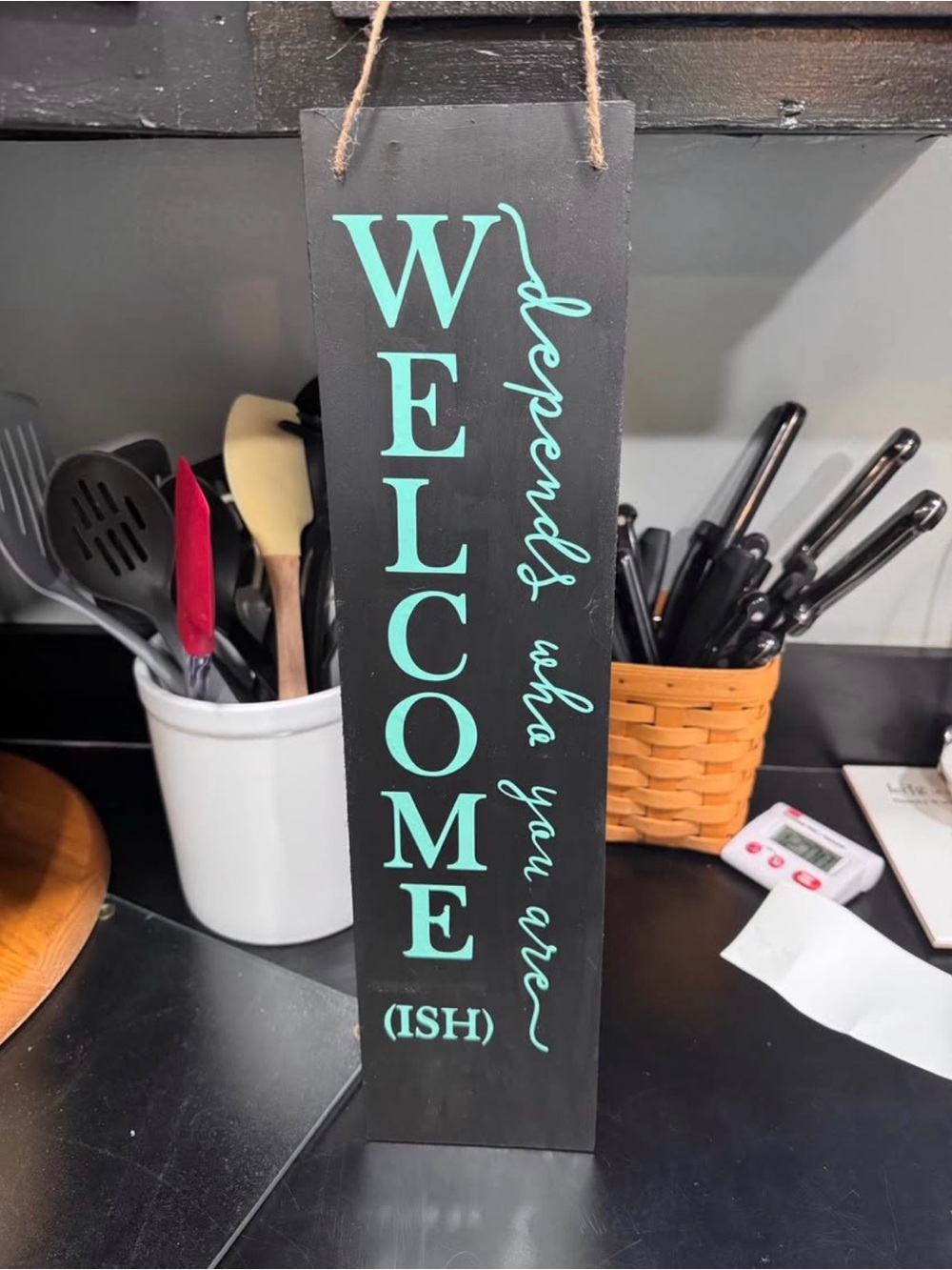 Welcome (Ish) Vertical Wooden Sign - Black with Teal Lettering